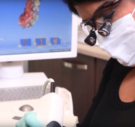 Dentist using cerec machine