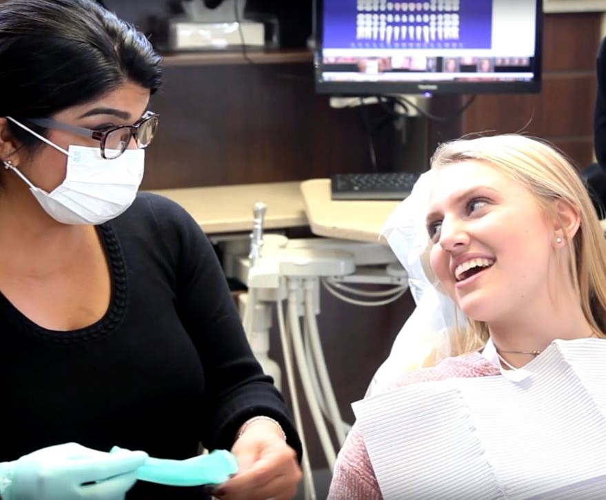 girl laughing with Camp Hill Dentist